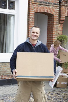 Man with van removal service loading furniture in Ireland