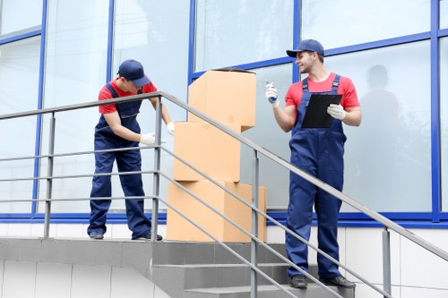 Removal team preparing items safely for a house move