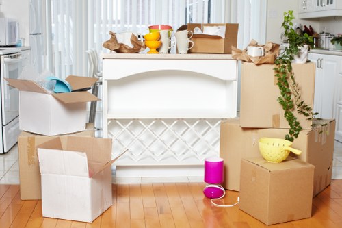 Packed boxes and furniture ready for transport