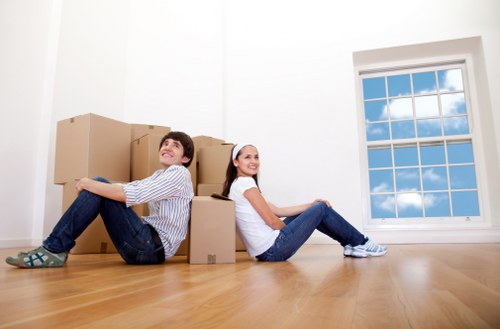 Removal truck loading household furniture and boxes