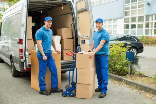 Local removals team managing access and loading in an Irish street
