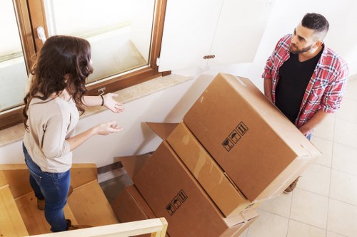 Staff preparing desks and IT equipment for an office relocation