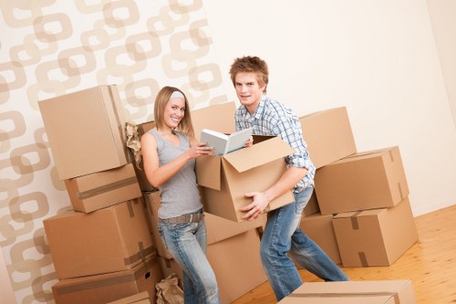 Packed moving boxes and furniture ready for transport